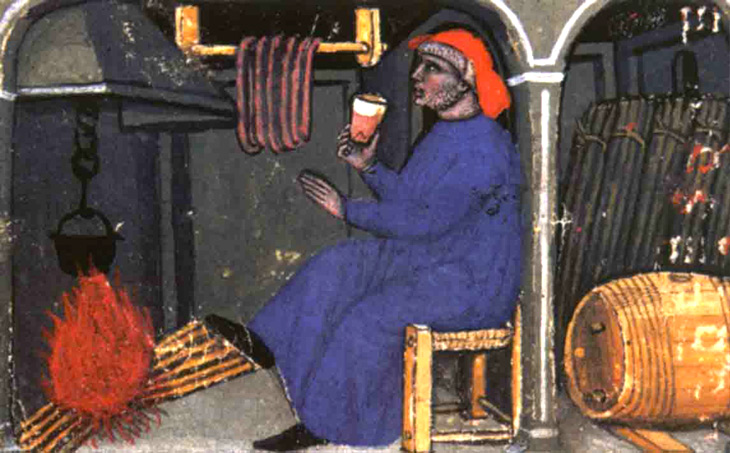 Een drinkende pelgrim bij het warme haardvuur van een gasthuis. Miniatuur. Getijdenboek van de H. Maagd Maria. 1395